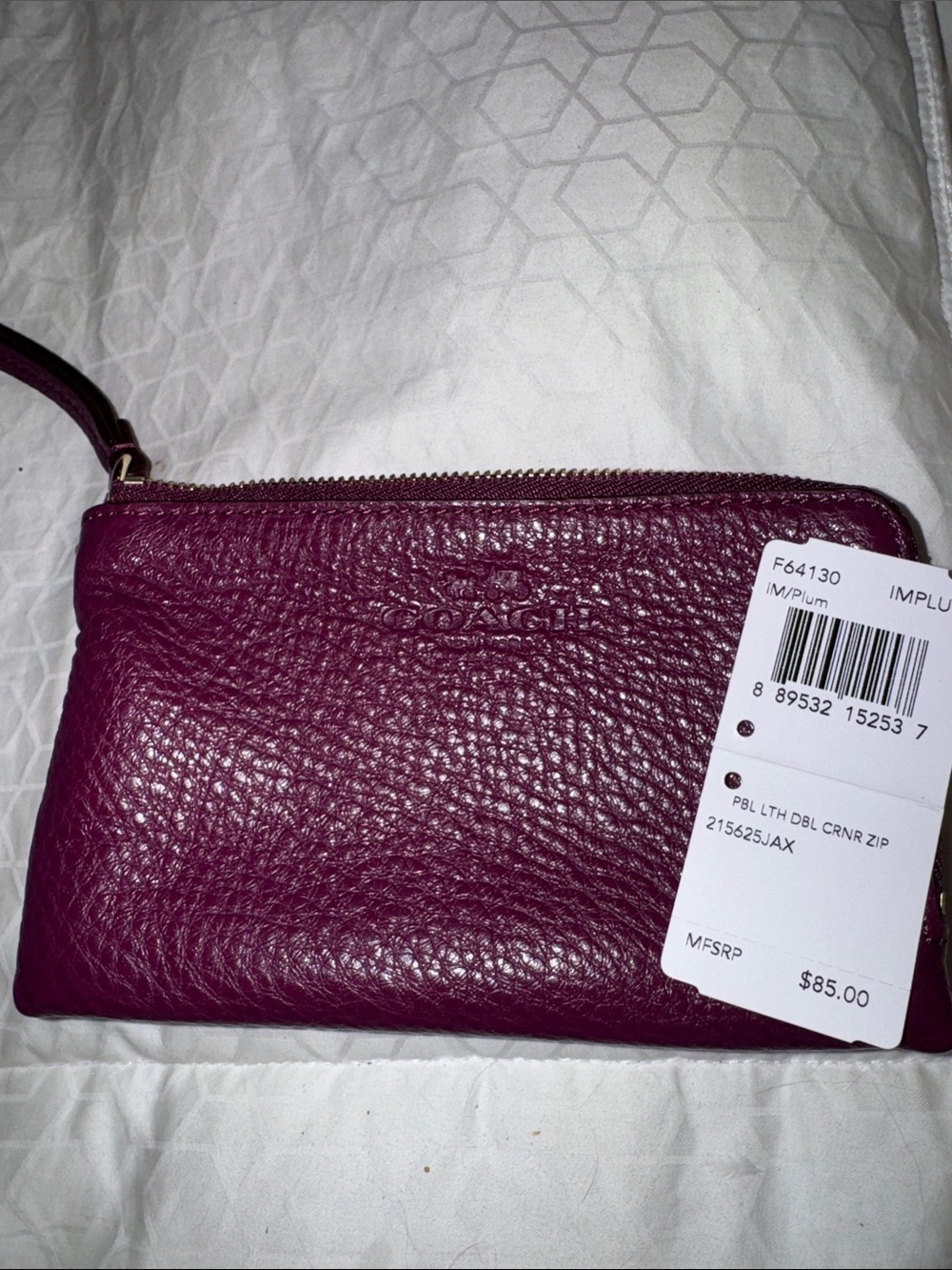 Coach Pebbled Leather Wristlet in Plum